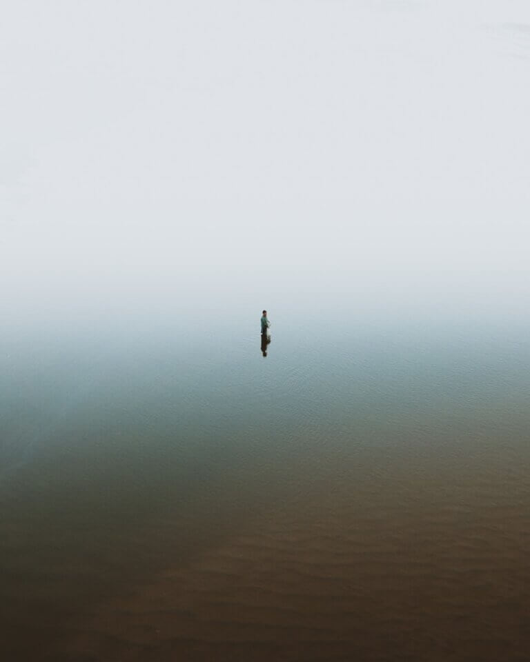 person in body of water during daytime